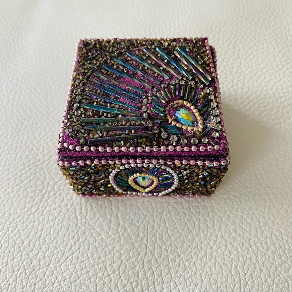 Small decorated keepsake box purple art work